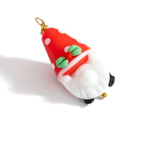 Handmade red Christmas gnome charm pendant with holly leaves and white polka dot hat