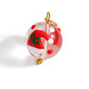 Christmas theme glass bead pendant with red polka dots and Santa hat design