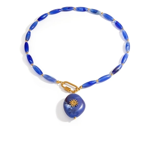 Bohemian stainless steel blue beaded heart necklace with a sun emblem pendant detail