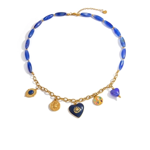 Vintage stainless steel necklace with blue beads and gold lucky heart charms