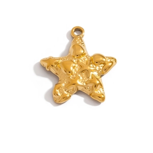 Macro view of polished 18K gold starfish charm with embossed texture and metal ring buckle