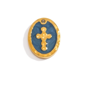 Oval gold plated pendant with dark blue enamel inlay and a raised central cross