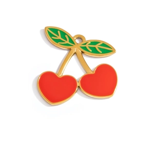 Detail of 18K gold plated cherry pendant with red heart fruits and green enamel leaves