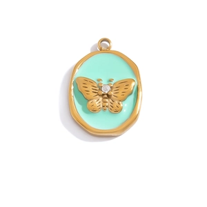 Detail of mint green enamel oval pendant with gold butterfly and zircon stone