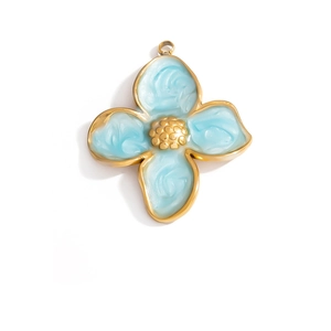 Detailed macro view of blue enamel flower pendant with golden metal petals and swirl texture