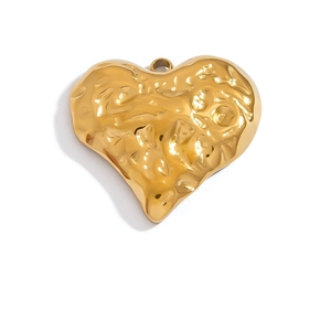 Detail of 18K gold-plated stainless steel hammered heart pendant for DIY jewelry