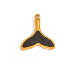 Detail of whale tail pendant with black enamel inlay and 18K gold plated metal finish