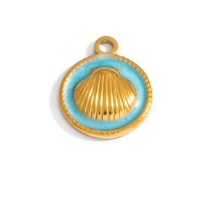 Detailed close-up of a vintage golden shell pendant with light blue enamel finish