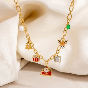 Detail of gold Christmas necklace with Santa sleigh, elk, and colorful stone charms