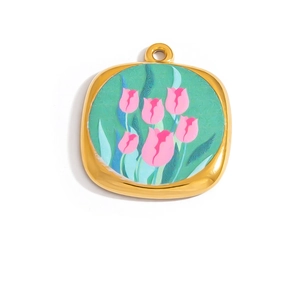 Detailed macro view of 18K gold plated square tulip enamel pendant with polished finish