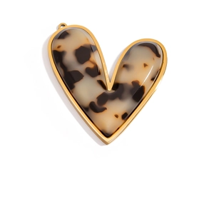 Detail of 18K gold stainless steel heart charm with tortoiseshell resin inlay and bail