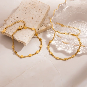 Minimalist 18K gold plated stainless steel bracelets with flower and disc charms