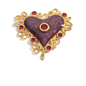 Macro detail of heart charm with purple marble texture and 18K gold LOVE engraving