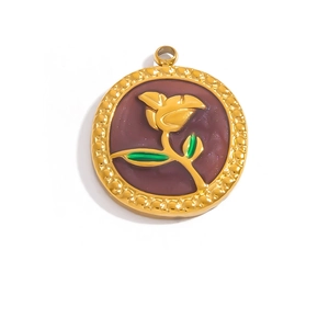 Macro detail of 18K gold plated round pendant with purple enamel and golden rose flower