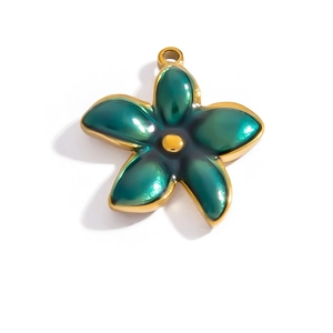 Detailed view of five-petal flower pendant with 18K gold frame and green enamel finish