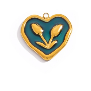 Detailed view of heart-shaped pendant with 18K gold tulip on teal enamel background