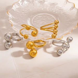 Minimalist 18K gold and silver stainless steel rings with multiple small metal ball beads