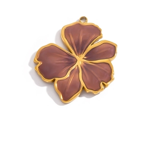 Detailed macro view of 18K gold plated purple enamel flower pendant for DIY jewelry