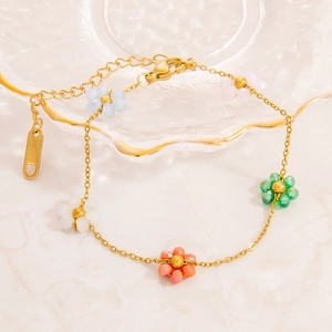 Bracelet en acier inoxydable plaqué or 18 carats avec pendentifs fleurs colorées