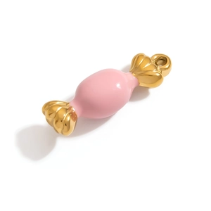 Macro shot of a pink candy-shaped enamel pendant with 18K gold plated metal accents