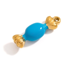 Macro detail of blue enamel candy pendant charm with gold plated shell textures for DIY jewelry