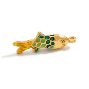 Detail of fish pendant in gold metal with green enamel scales and hanging ring