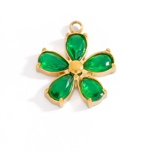 Macro detail of 18K gold plated five-petal flower pendant with green teardrop zircon stones
