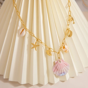18K gold-plated paperclip chain necklace with sea star, dolphin and pink shell charms
