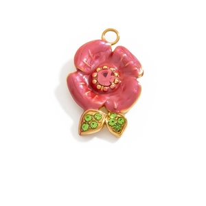 Pink enamel flower pendant in gold finish with green leaf accents and crystals