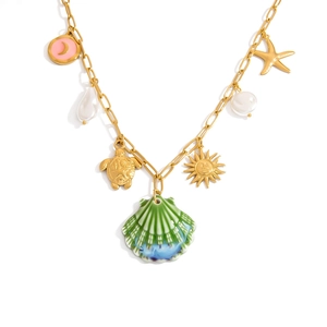 Detail of 18K gold plated paperclip necklace with ocean shell and pearl charms