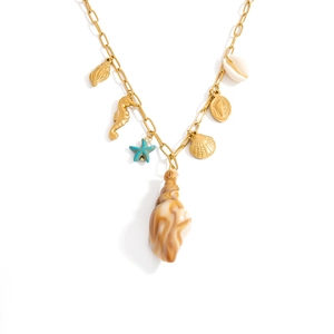 Detail of 18K gold paperclip chain necklace with sea shells, starfish and seahorse charms