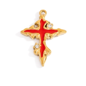 Detailed view of Gothic cross pendant with red enamel and 18K gold plated metal