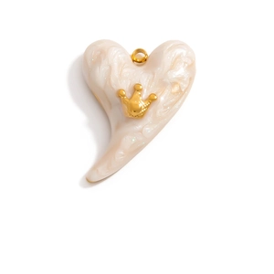 Detailed close-up of marble pattern heart charm with golden crown and ring attachment