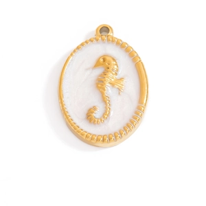 Detailed macro view of an oval 18K gold-plated pendant featuring a carved seahorse