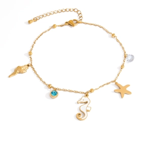 Gold stainless steel anklet with ocean sea star, seahorse, and shell charms on white background