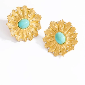 Detalle de los pendientes de girasol en oro de 18 quilates con turquesa y cristales