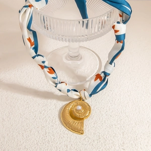Elegant 18K gold nautilus shell necklace with pearl and floral silk scarf band