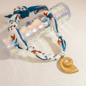 Silk scarf necklace with golden seashell pendant and pearl detail in 18K gold finish