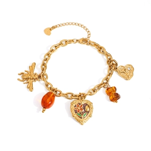 18K gold plated stainless steel bracelet with bee, amber beads and floral heart charms
