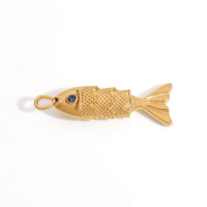Detailed close-up of a golden fish pendant with blue gemstone eye and scale texture