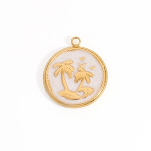 Detailed macro view of 18K gold palm tree relief pendant with white enamel finish