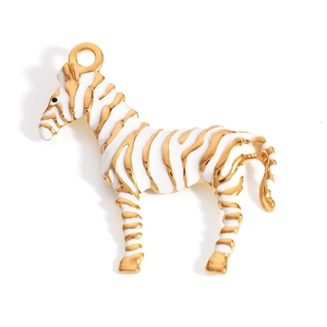 Macro detail of zebra pendant with 18K gold plating and white enamel stripes