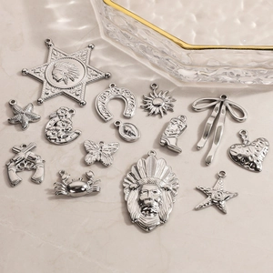 Polished stainless steel charms including starfish, heart, and butterfly for DIY jewelry
