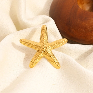Broche étoile de mer minimaliste en acier inoxydable plaqué or 18 carats sur tissu