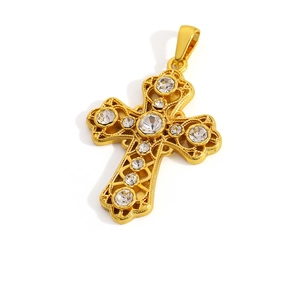 Detailed gold plated stainless steel cross pendant with sparkling zircon gemstones