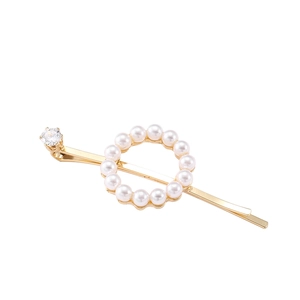 Elegant gold butterfly hair clip with white pearls and sparkling cubic zirconia stones
