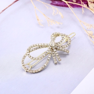 Elegante pasador de pelo con lazo dorado y brillantes diamantes de imitación para mujer