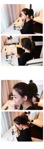 Detailed view of an elegant black beaded hair tie styled on a model high ponytail
