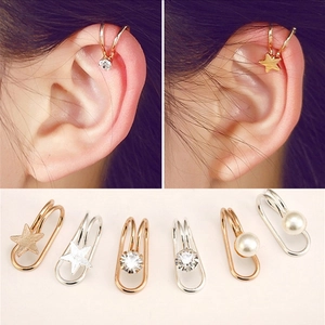 Star and zircon ear cuff set in gold and silver finish for non-pierced ears