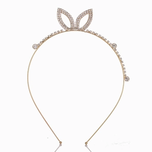 Elegante cerchietto in metallo dorato con orecchie di coniglio in strass per bambina